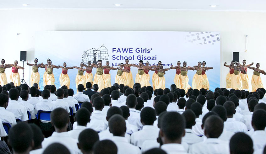 Fawe Girls students entertain Chinese First Lady Peng Liyuan and First Lady Jeannette Kagame during their visit to the school in July last year. Courtesy.