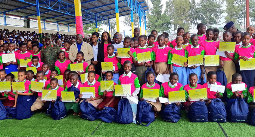 Some of the students that were rewarded for their good performance pose with their certificates. (Courtesy photos)