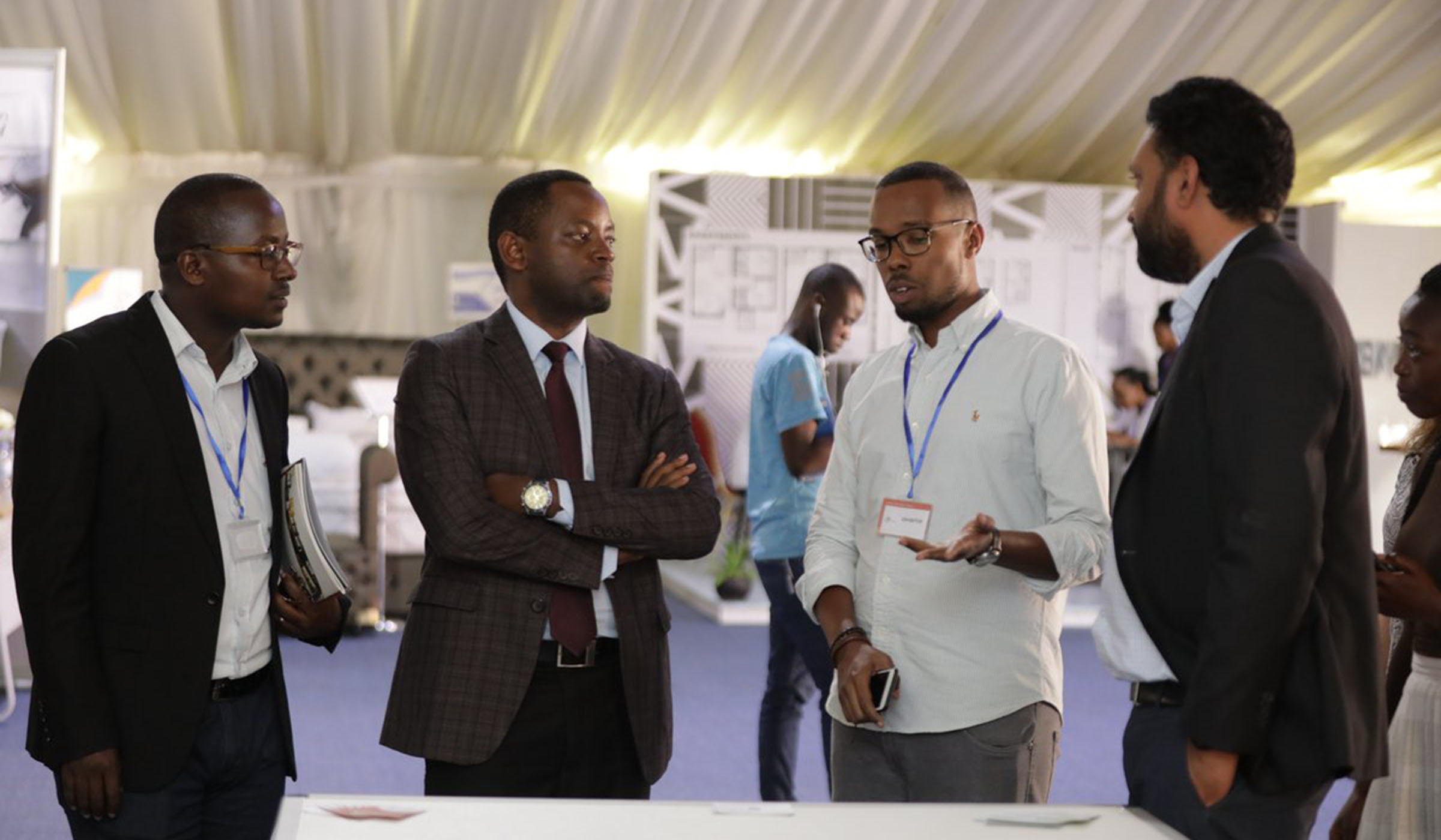 An exhibitor (c) showing the products to the officials during the expo. Courtesy.