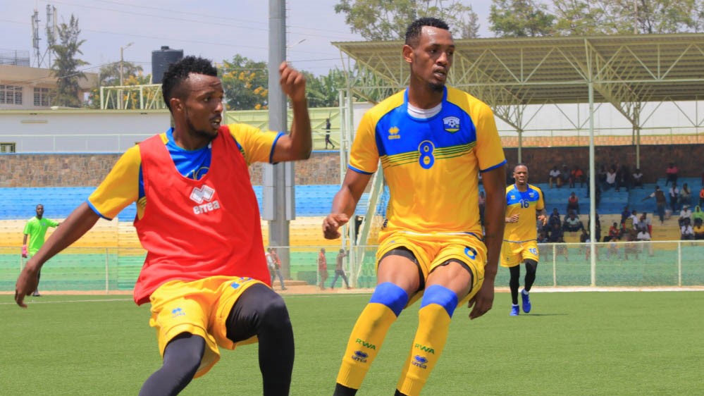 APR duo of Dominique Savio Nshuti (left) and Ally Niyonzima, seen here in action during the team's final training session at Kigali Stadium, are part of the 23-man final squad. Saddam Mihigo