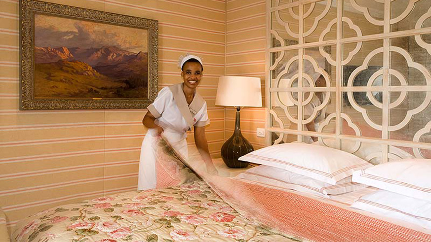 An employee in hotel room service . Net 