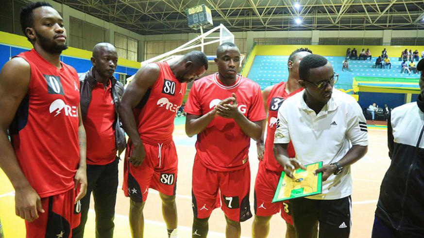 Patrick Ngwijuruvugo briefs his REG players during a preseason match. File.