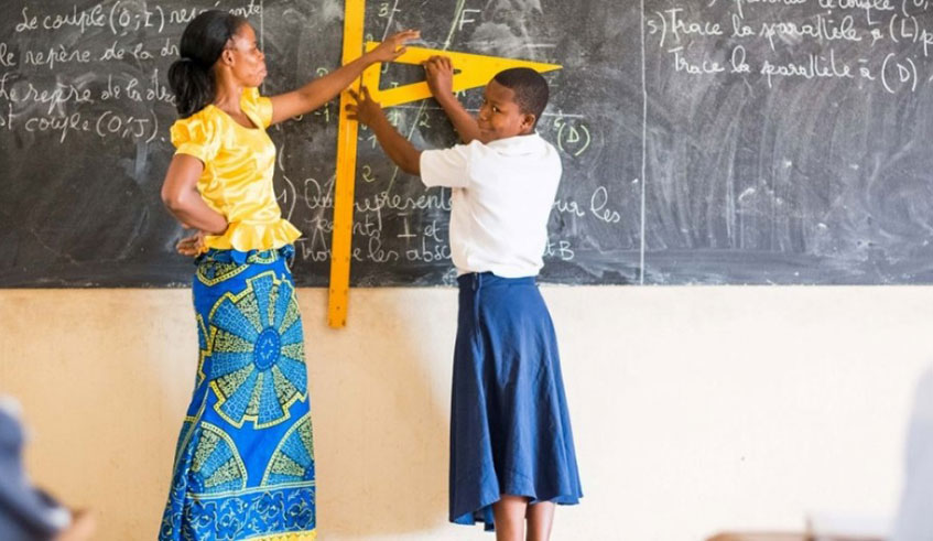 A student and her teacher in class. UNESCOu2019s 2019 Global Education Monitoring Report puts a spotlight on migrants and refugees. Net Photo