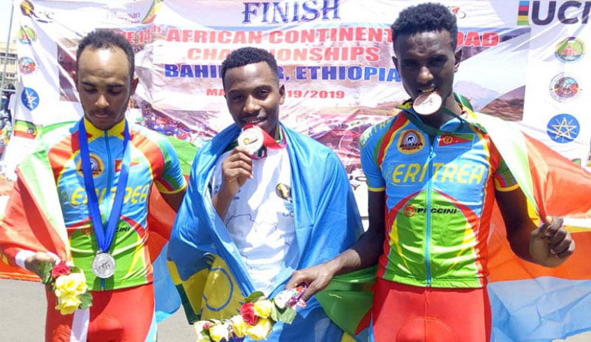 Renus Byiza Uhiriwe (centre), who won a gold medal at African championships last week in Ethiopia, will lead Team Rwanda juniors at the upcoming ANOCA Youth Games. File