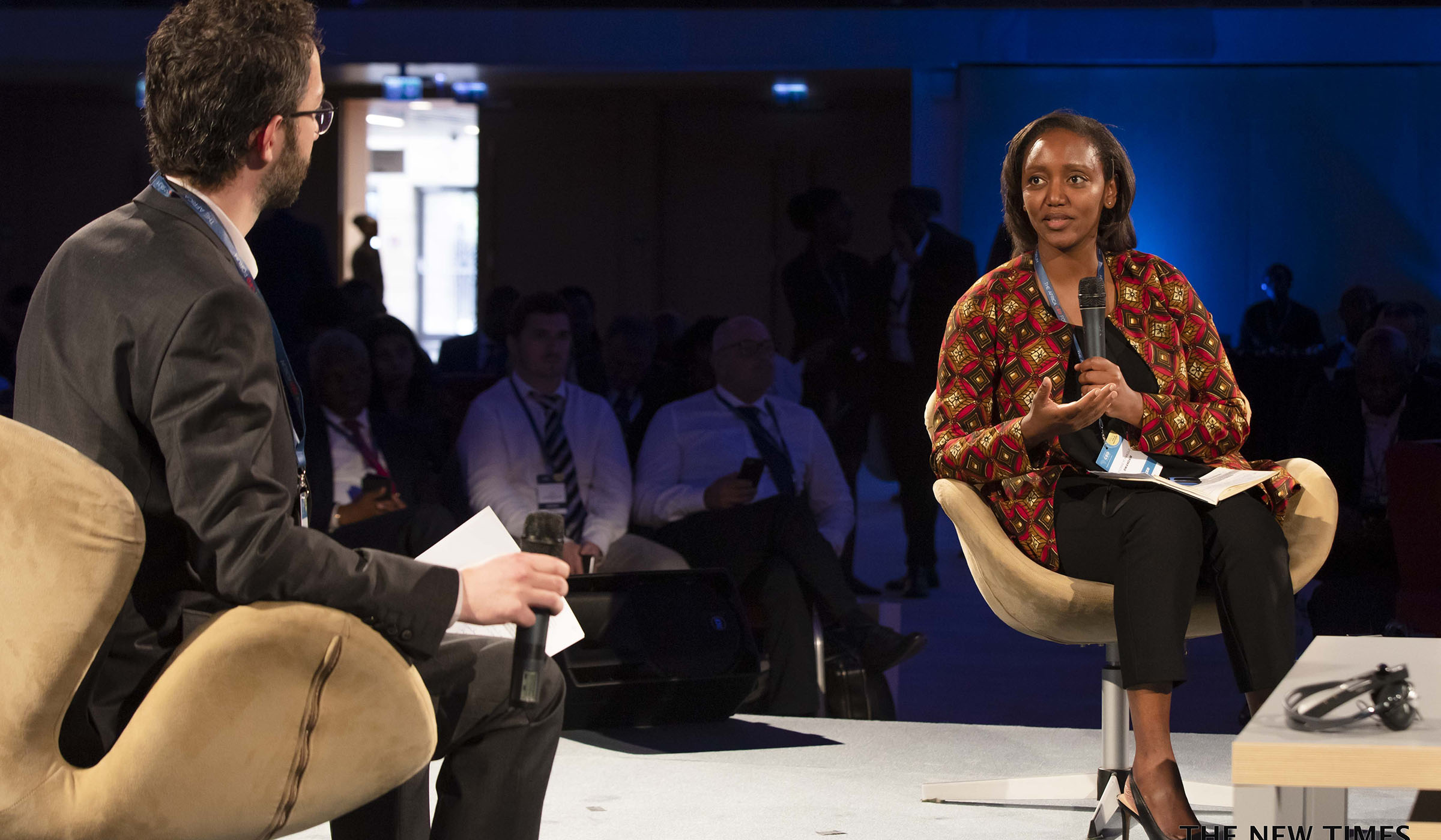RwandAir Chief Executive Officer Yvonne Makolo delivers her remarks during Africa CEO Forum in Kigali on March 25, 2019.  Emmanuel Kwizera.
