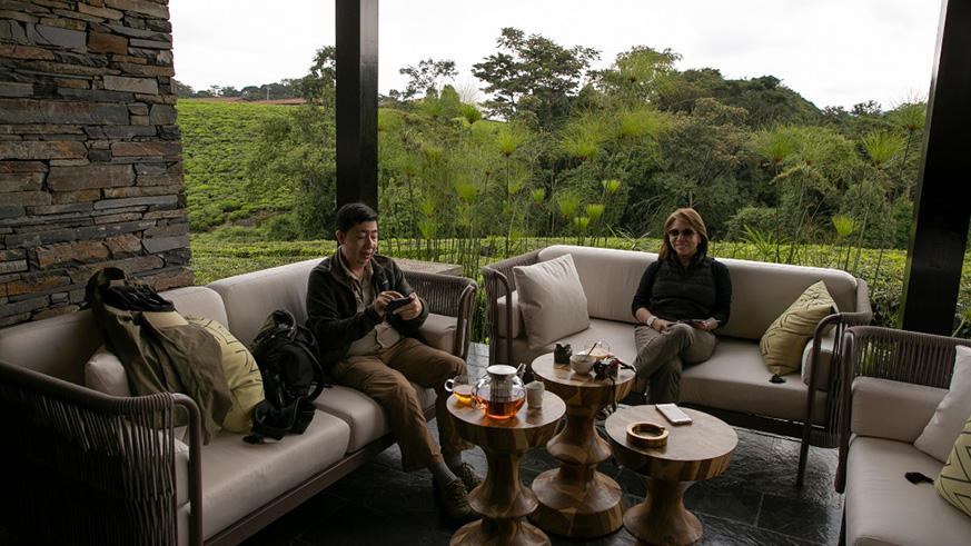 Victor Dizon (left), a tourist from Philippines, at Nyungwe House with his partner. He said he feels safe when he visits Rwanda. Courtesy.