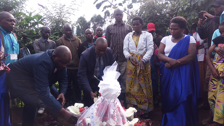 The mayor of Musanze District, Jean Damascene Habyarimana (2nd-L) was among other mourners who turned up to comfort the deceased family. Regis Umurengezi