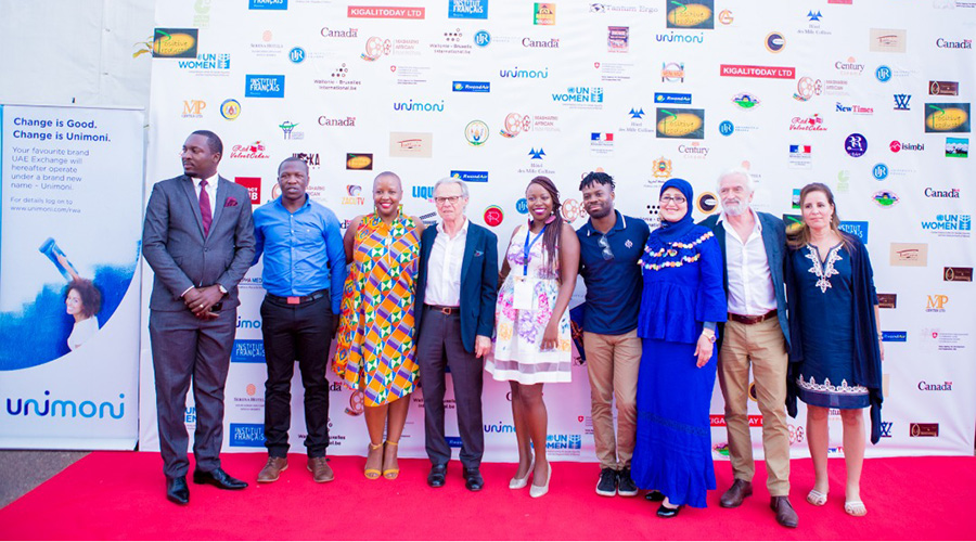 MAFF director and founder Tresor Senga (left) with members of the jury during the festival closing ceremony. / Eddie Nsabimana