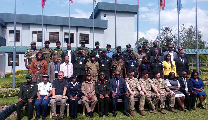 Participants of Integrated Mission Planning Course pose for a group photo at the Rwanda Peace Academy premises in Musanze District, Northern Province. Ru00e9gis Umurengezi.