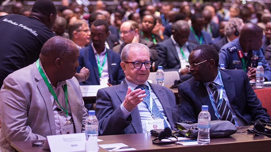 A cross-section of delegates, including, front row, left-right, Prof. Jean Pierre Dusingizemungu, President of Ibuka, the umbrella of Genocide survivor organisations; Judge Carmel Agius, President, International Residual Mechanism for Criminal Tribunals; and Martin Ngoga, Speaker, East African Legislative Assembly at the conference at Intare Arena in Rusororo, Gasabo District on April 4, 2019. Nadege Imbabazi.