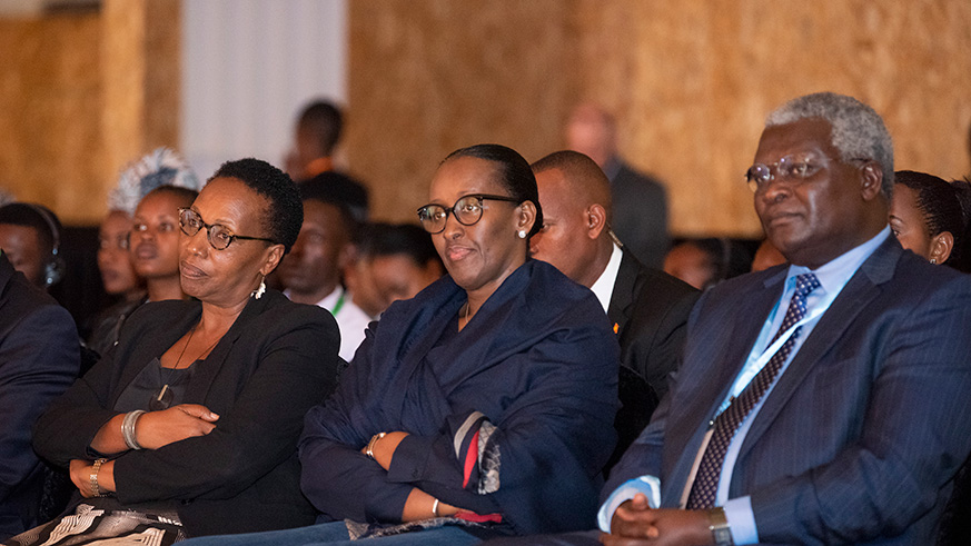 First Lady Jeannette Kagame during the Cafu00e9 Littu00e9raire at Kigali Conference Exhibition Village on Thursday. She is flanked by Dr Clet Niyikiza, the founder of global pharmaceutical firm, L.E.A.F and Radegonde Ndejuru (L). Courtesy 