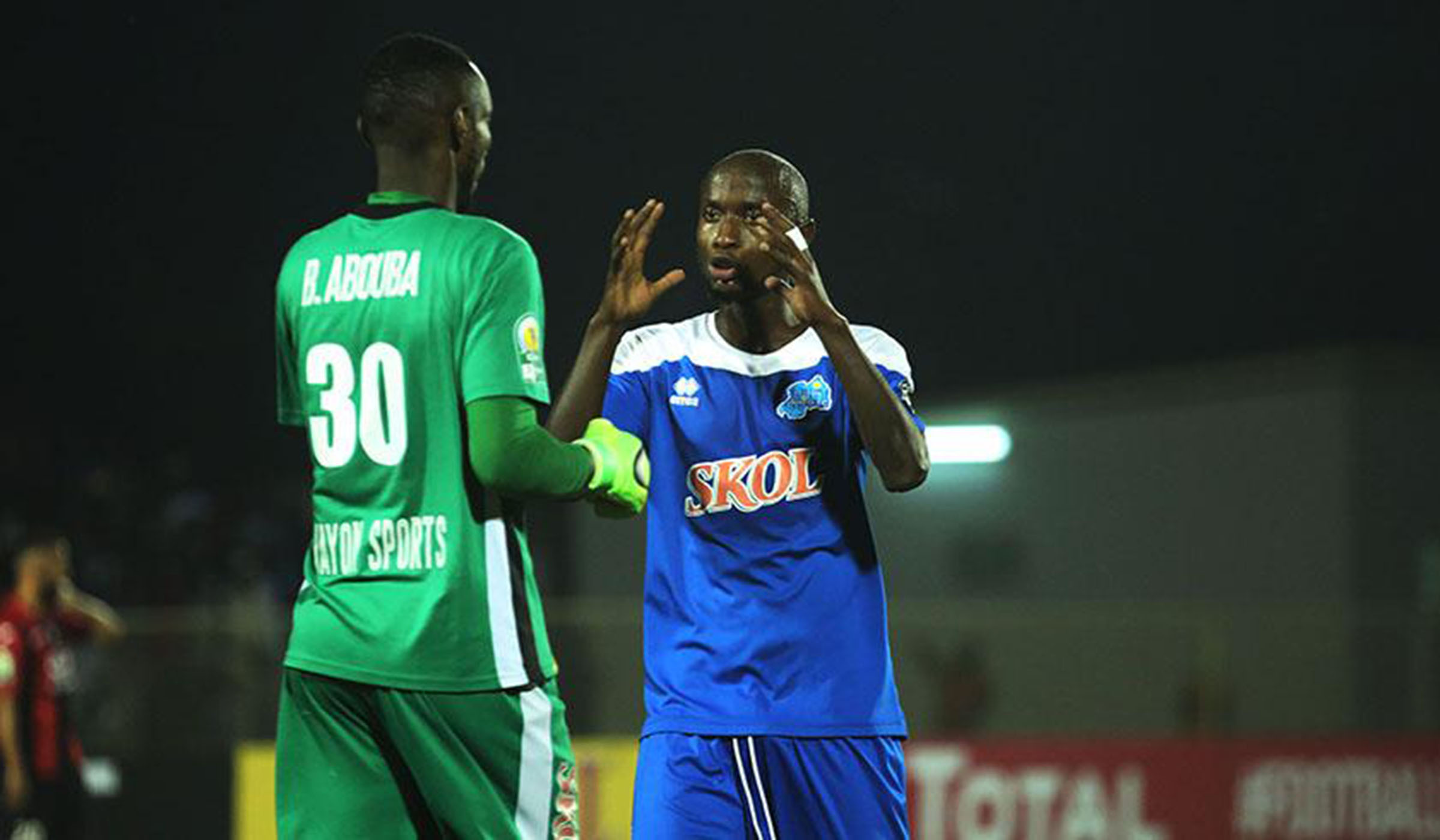 Centre back Thierry Manzi talks to Rayon Sports goalkeeper Abouba Bashunga during a past CAF Confederation Cup match against USM Alger, of Algeria, at Kigali Stadium. File