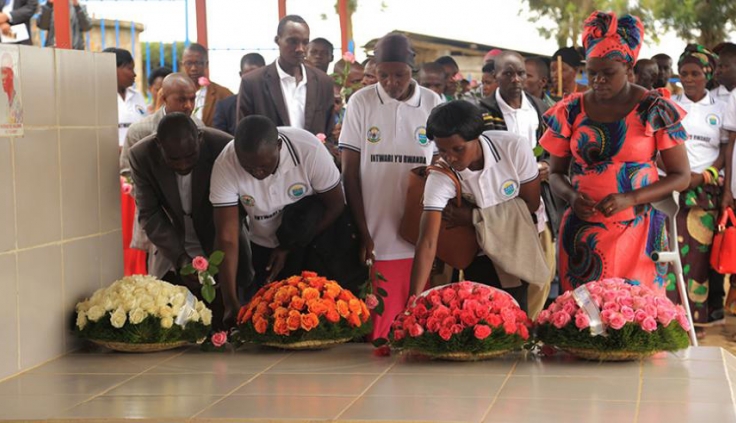 Some of the heroes from ES Nyange lay wreaths on the grave of Valens Ndemeye in honour of his memory, last year. Photos by Sam Ngendahimana.