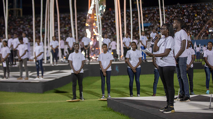 Young people recite some of the names of Genocide victims whose families were wiped out during the 1994 Genocide against the Tutsi. This was during Sundayu2019s night vigil at Amahoro National Stadium in Remera as Rwanda began a one-week official mourning period in honour of the over one million victims of the Genocide.Emmanuel Kwizera.