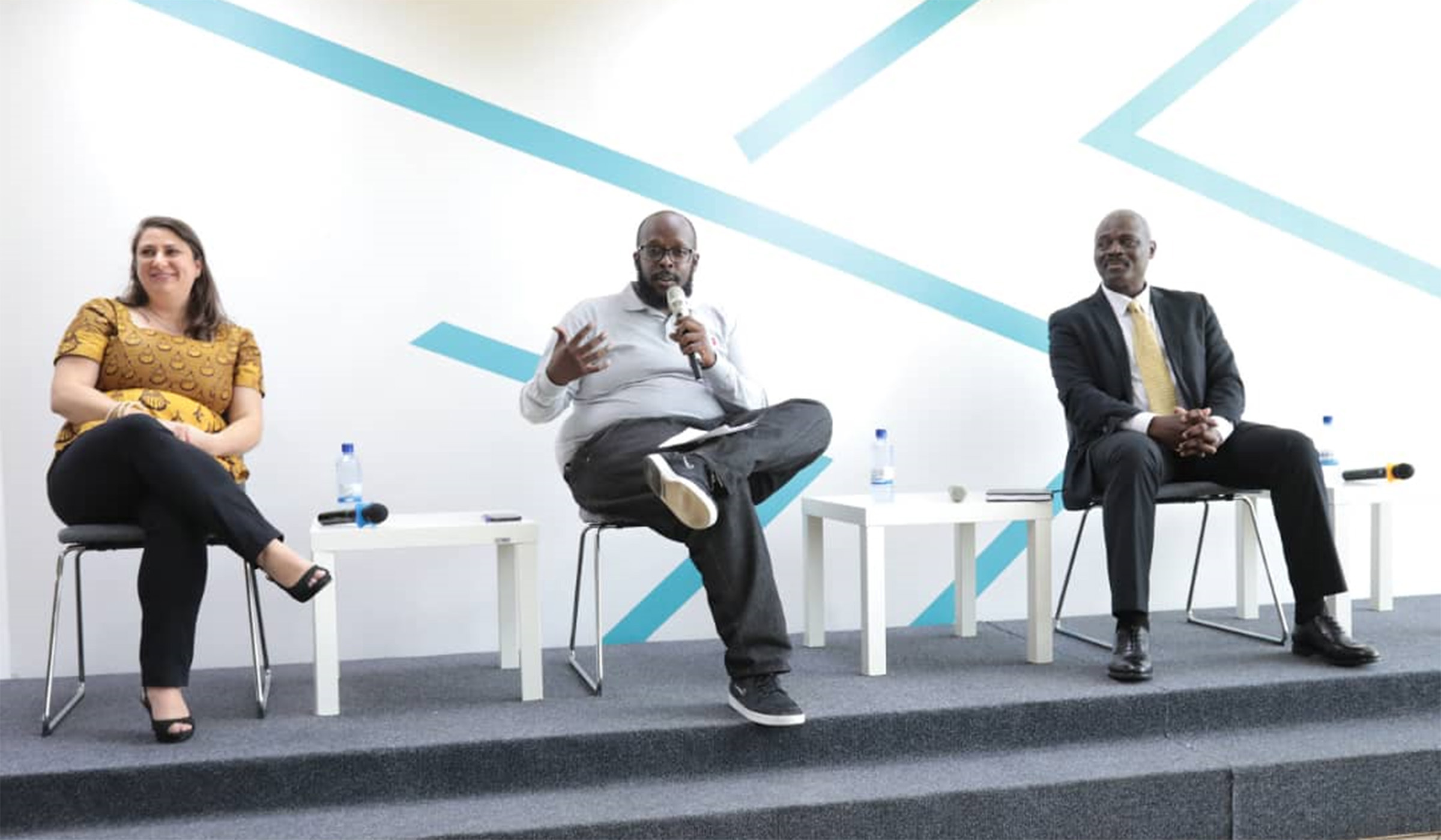 (From L-R) -  Samantha Lakin, Jean Michel Habineza(moderator) and Peter Sosi, during the reading for change discussions at Kigali Public Library, Kacyiru. Joan Mbabazi.