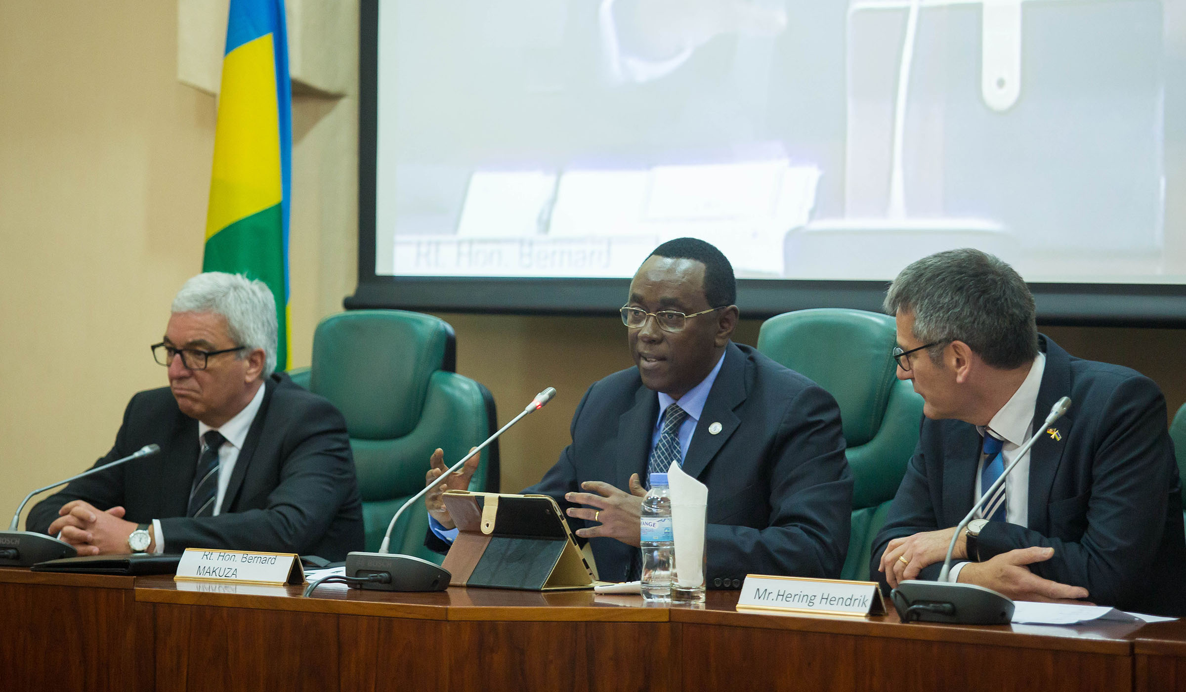 The President of Senate, Bernard Makuza (centre), addresses a delegation from Germanyu2019s Rhineland-Palatinate state. Looking on are Hering Hendrik, the President of the State Parliament (right) and Roger Guenter Josef Lewentz, the Minister for Internal Affairs of Rhineland-Palatinate, at Parliament yesterday. Makuza called on the world to emulate Germany and enact laws that deal with the crime of genocide and other crimes against humanity. Nadege Imbabazi.