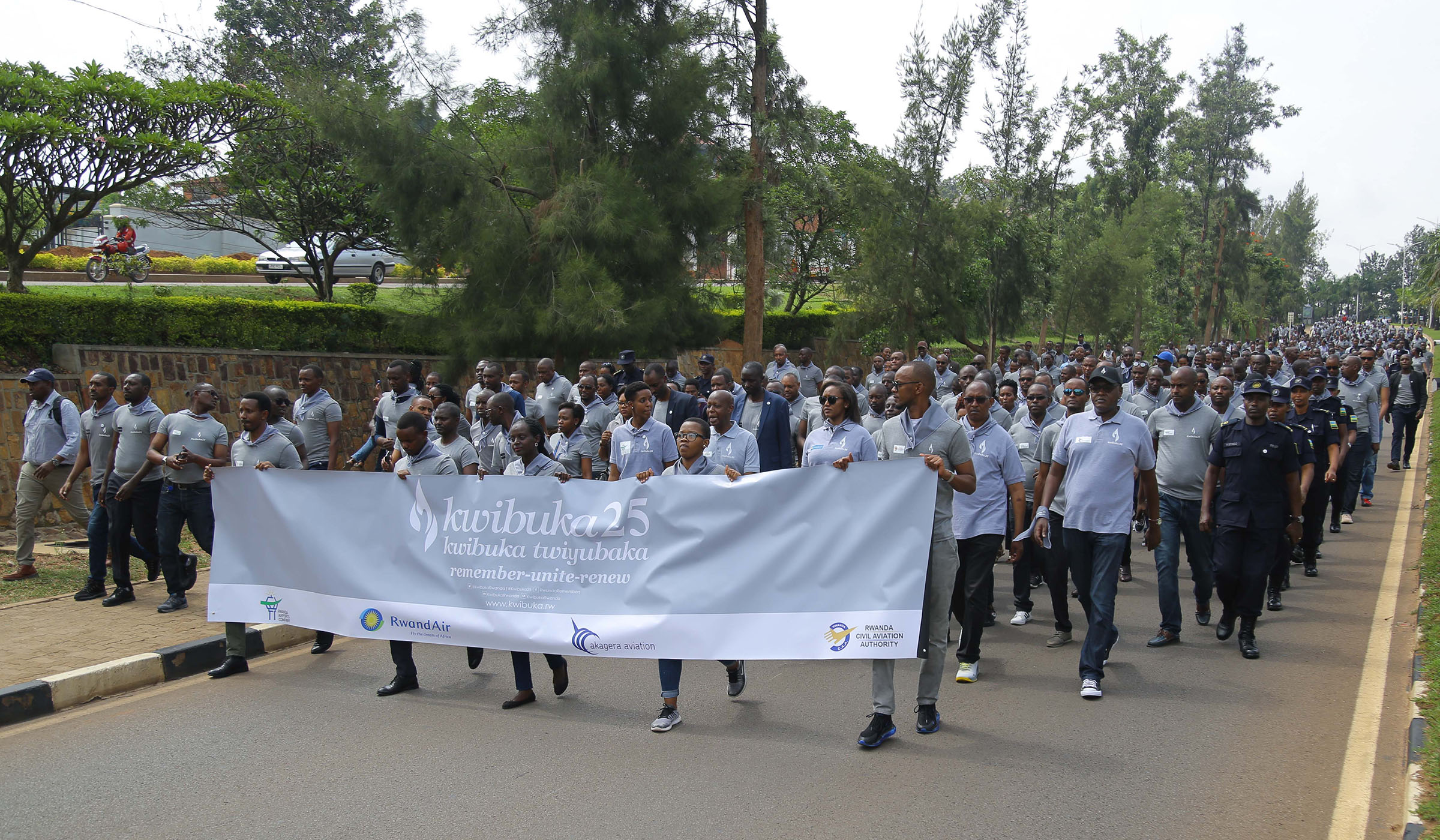 Members of the aviation community in a Walk to Remember, from Amahoro Stadium to Parliamentary Buildings, on April 10, 2019. A host of private and public organisations yesterday joined Rwandans to commemorate the victims of the 1994 Genocide against the Tutsi. Sam Ngendahimana.