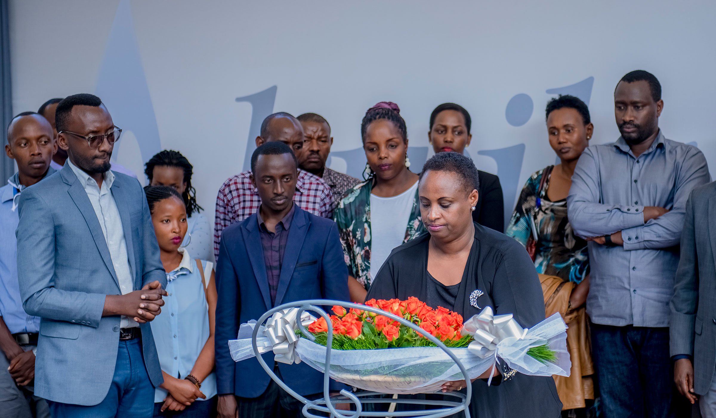 Usta Kaitesi, Ag. CEO for Rwanda Governance Board and members RGB lay wreaths at Kigali Genocide Memorial Centre on April 10, 2019. Courtesy