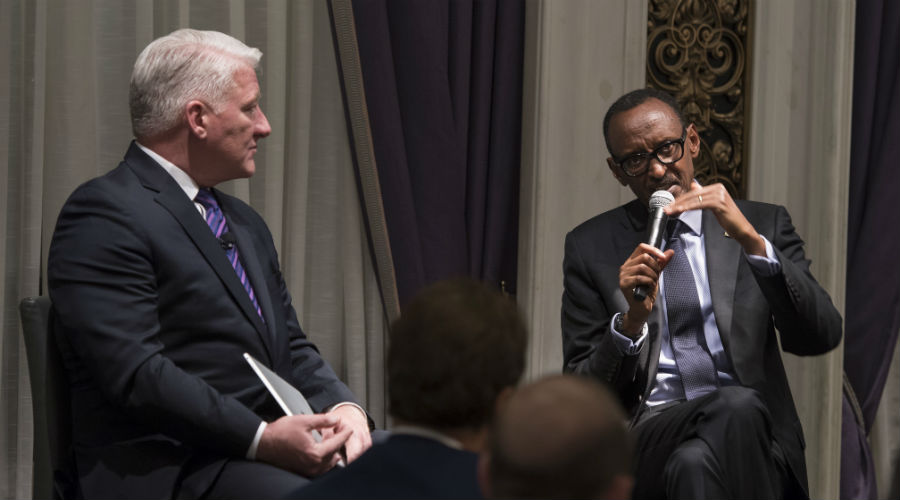 President Kagame speaks at the NBA dinner in a session moderated by CNN News Anchor and Chief National Correspondent John King (left). / Village Urugwiro