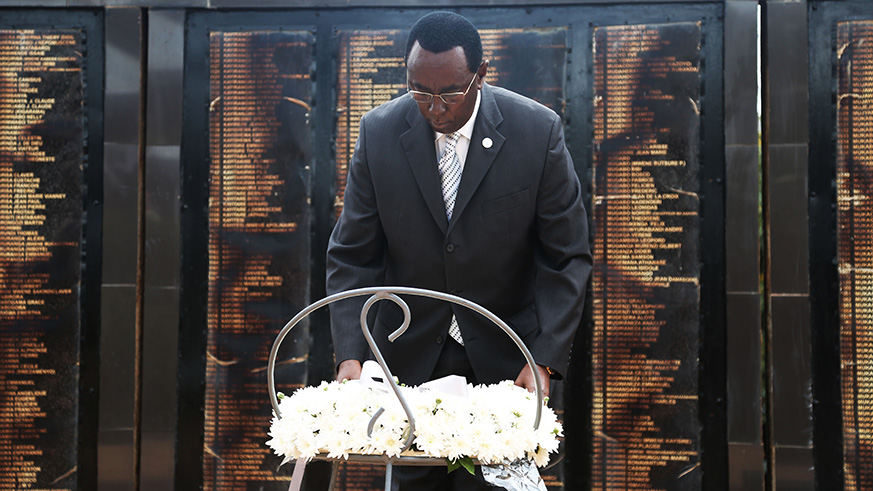 President of the Senate Bernard Makuza lays a wreath at Rebero Genocide Memorial on Saturday. Over 14,000 Genocide victims, including 12 politicians, are buried at the memorial site. Sam Ngendahimana.