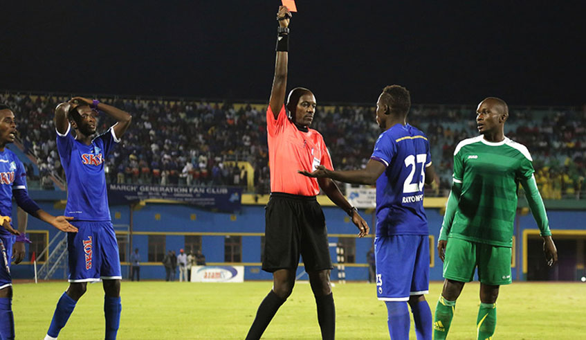 Louis Hakizimana shows a red card to former Rayon Sports skipper Pierrot Kwizera during the 2018 Agaciro Cup tournament. File.