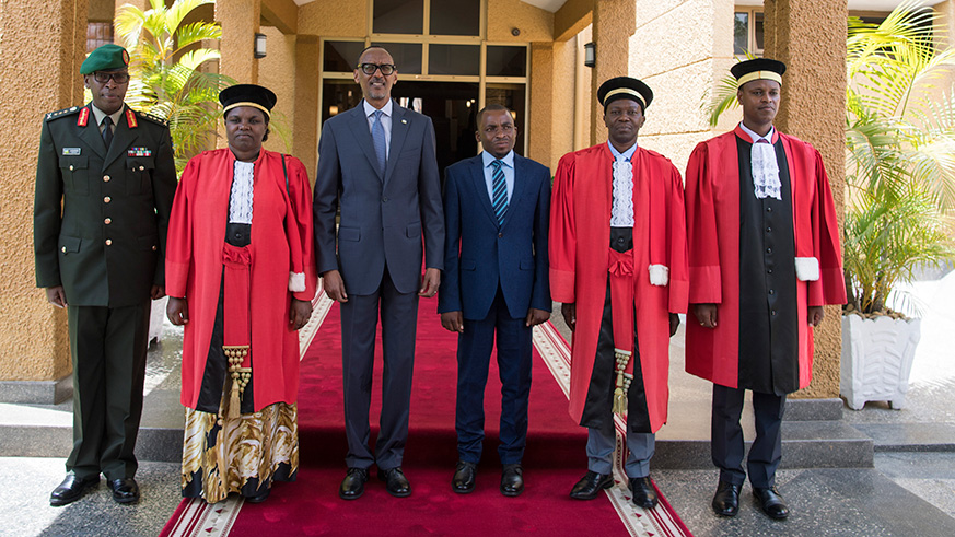 President Kagame poses for a group photo with newly sworn-in officials; left-right, RDF Army Chief of Staff Lt Gen Jean Jacques Mupenzi, Court of Appeal Judge Venantie Tugireyezu, MP Emmanuel Ndoriyobijya, as well as Supreme Court justices Alphonse Hitiyaremye and Franu00e7ois-Ru00e9gis Rukundakuvuga at the Parliamentary Buildings in Kigali yesterday. The Head of State called on the newly appointed judges to uphold professionalism and deliver timely, equitable and fair justice. Village Urugwiro.