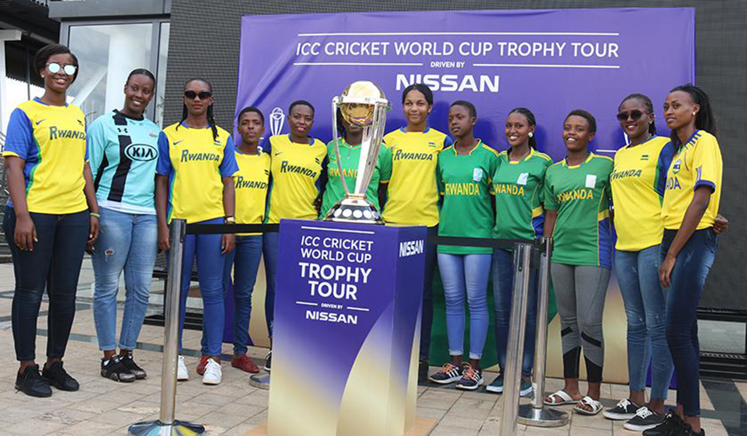 The national women cricket team pose for a group photo with the ICC World Cricket Cup trophy during its tour of Rwanda in February. File.
