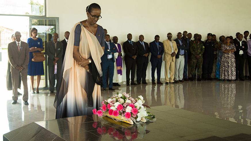 First Lady Jeannette Kagame bows to honor Queen Rosalie Gicanda who was killed during the 1994 genocide against the Tusti. courtesy