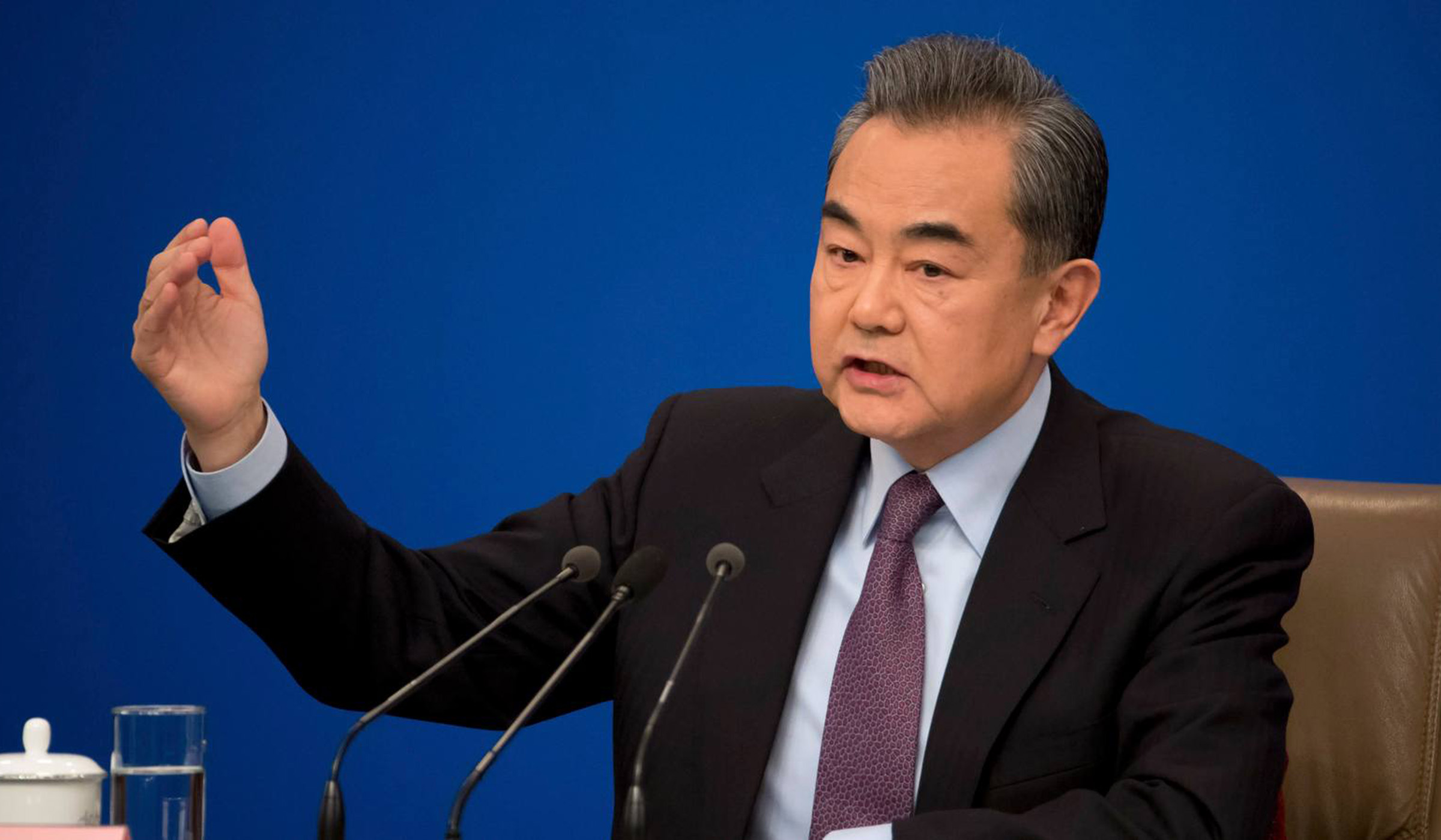 Wang Yi, Chinese State Councilor and Foreign Minister, briefs media on Friday in Beijing. Net photo.
