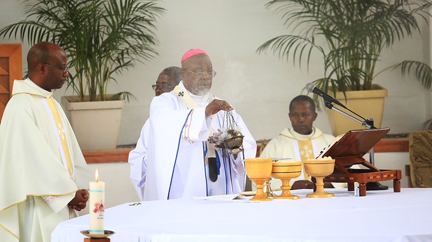 Archbishop Thadu00e9e Ntihinyurwa during holy mass at St Michel recently. Clerics in Rwanda have called on the Christian faithful to use Easter Sunday as a time for confessing their sins and asking for forgiveness. Sam Ngendahimana.