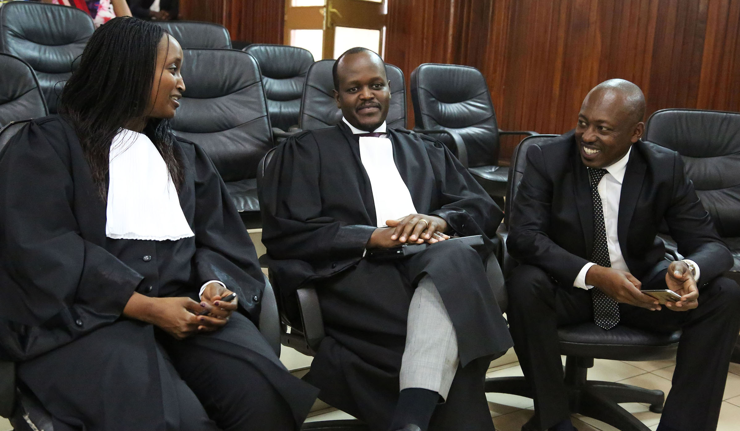Richard Mugisha (right) consults with his lawyers Moise Nkundabarashi and Florida Kabasinga (left) at the Supreme Court yesterday. Media practitioners have welcomed the decision by the Supreme Court to rule against some provisions in the penal law, which included those that criminalise humiliation of public authorities as well as defamation of religious rituals in the public. Sam Ngendahimana. Richard Mugisha (right) consults with his lawyers Moise Nkundabarashi and Florida Kabasinga (left) at the Supreme Court yesterday. Media practitioners have welcomed the decision by the Supreme Court to rule against some provisions in the penal law, which included those that criminalise humiliation of public authorities as well as defamation of religious rituals in the public. Sam Ngendahimana.