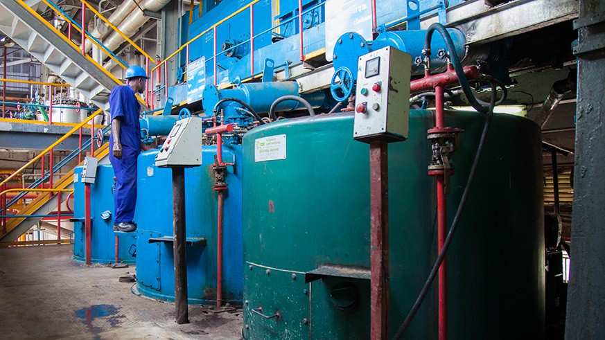 A machine operator at work at Kabuye Sugar Works factory. The company is set to lose Rwf6.6 billion in potential revenues after floods destroyed its 2,000 hectares of sugarcane u2013 the main raw material in sugar manufacturing. Nadege Imbabazi.
