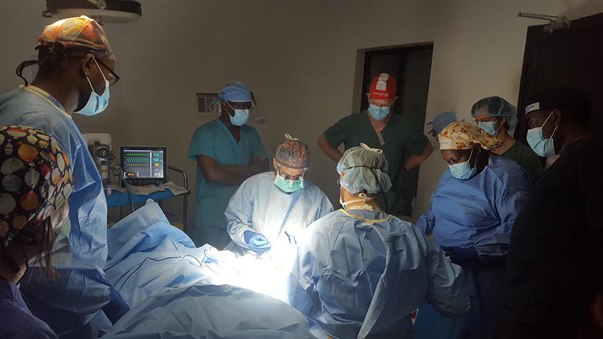 Plastic surgeons from Operation Smile with the Rwandan medical team doing free corrective plastic surgeries for patients with conditions such as post burn contractures, among others, at Rwinkwavu Hospital. /Courtesy Photo