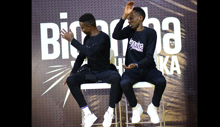 The main acts of the show Japhet and 5K Etienne (left), belt out some of their jokes at the Kigali Cultural Village  last weekend. Courtesy photos.