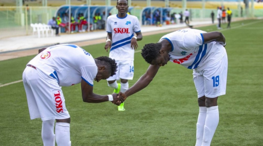 Jules Ulimwengu (L) and Michael Sarpong celebrate after they each scored two goals to inspire Rayon Sports to a comfortable 4-0 victory over Espoir FC at Kigali Stadium on Thursday. / Julius Ntare
