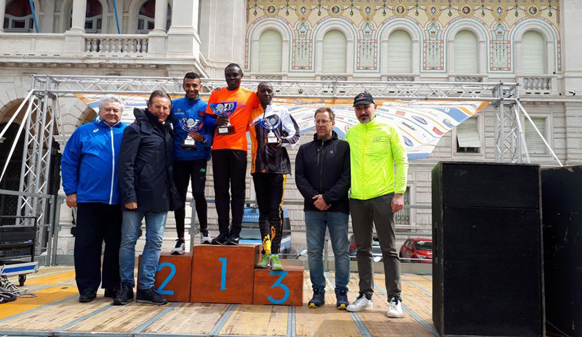 Noel Hitimana (C) on the podium after winning the 2019 Trieste Half-Marathon on Sunday. Courtesy