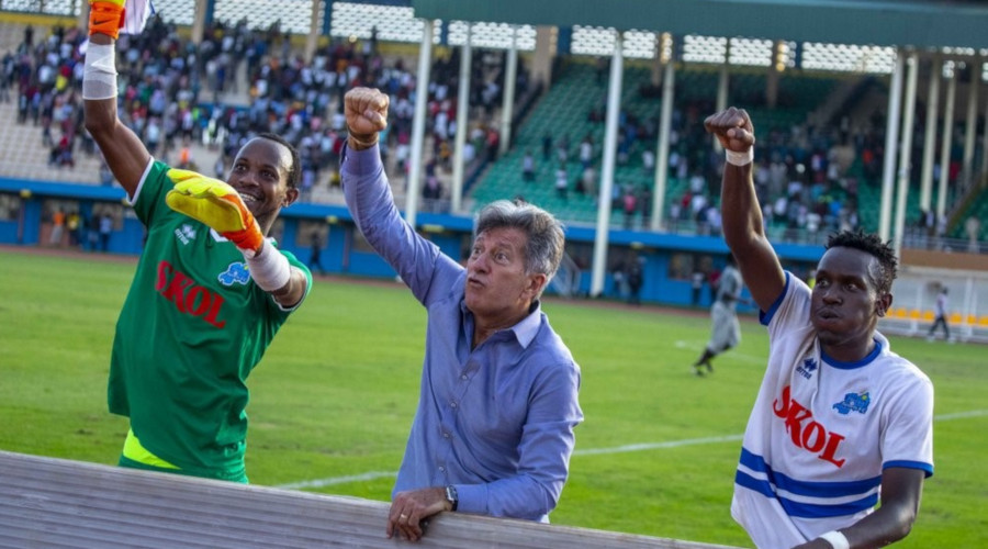 From L-R: Goalkeeper Andre Mazimpaka, head coach Oliveira Roberto Goncalves and winger Eric Iradukunda join Rayon Sports fans in celebrations after Sundayu2019s hard-fought 1-0 victory over Police at Amahoro Stadium. /Julius Ntare