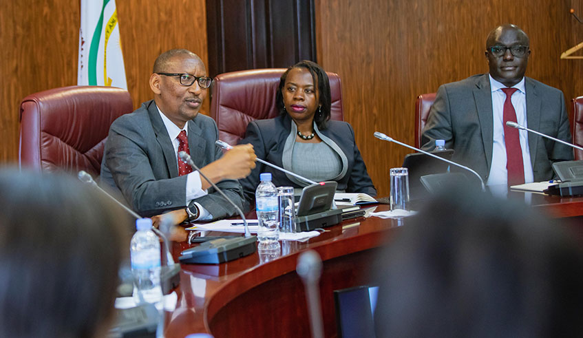 Central Bank Governor John Rwangombwa, addresses the news conference, as deputy governor Monique Nsanzabaganwa and BNR chief economist Thomas Kigabo look on in Kigali on May 6, 2019. Emmanuel Kwizera.