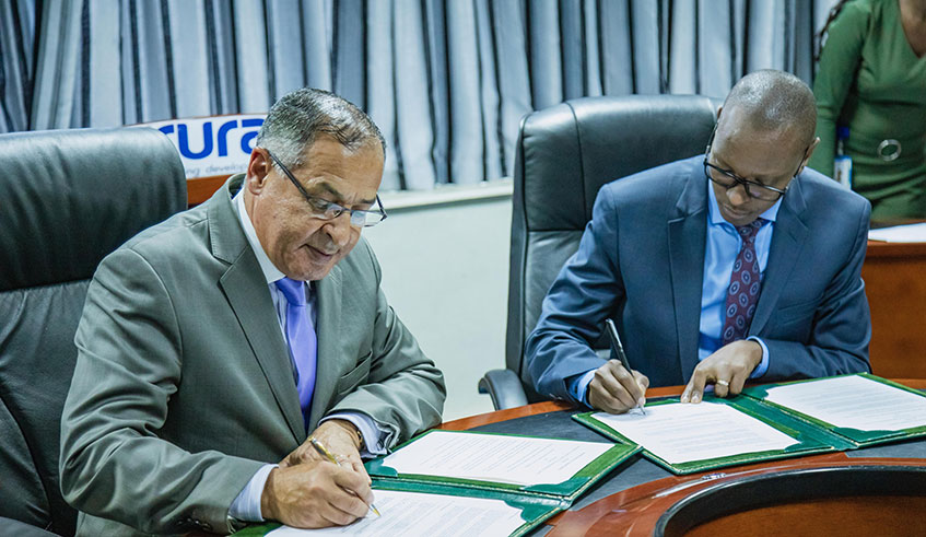Dr Khammar Mrabit, Director General of Moroccan Agency for Nuclear and Radiological Safety and Security, and Patrick Nyitishema, Director General of Rwanda Utilities Regulatory Authority, sign the agreement on May 8, 2019 in Kigali. Emmanuel Kwizera