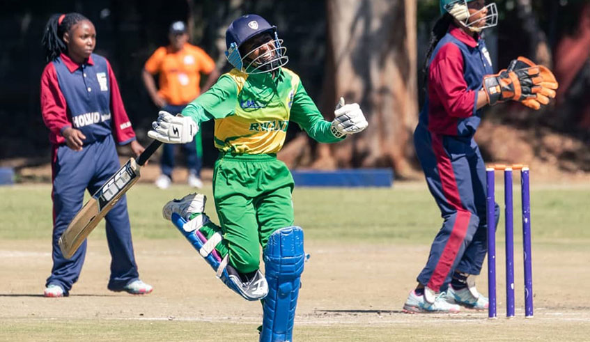 Josiane Nyirankundineza celebrates after helping Rwanda to the stunning one wicket victory over Mozambique on Wednesday. Courtesy