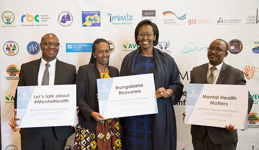  her Excellency Mrs Jeannette Kagame with (L-R) Hon Patrick Ndimubanzi - State Minister in the Ministry of Health, Mrs Annonciata Kaligirwa - Chairperson of ARCT RUHUKA and Dr Vincent Sezibera - President of Rwanda Psychological Society, at the National Trauma Symposium.Courtesy.