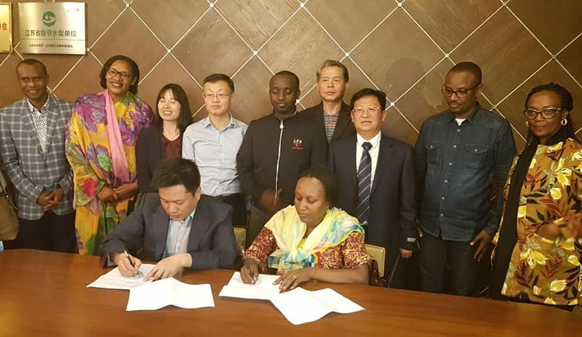 Representatives of the two companies at the signing ceremony. Courtesy.