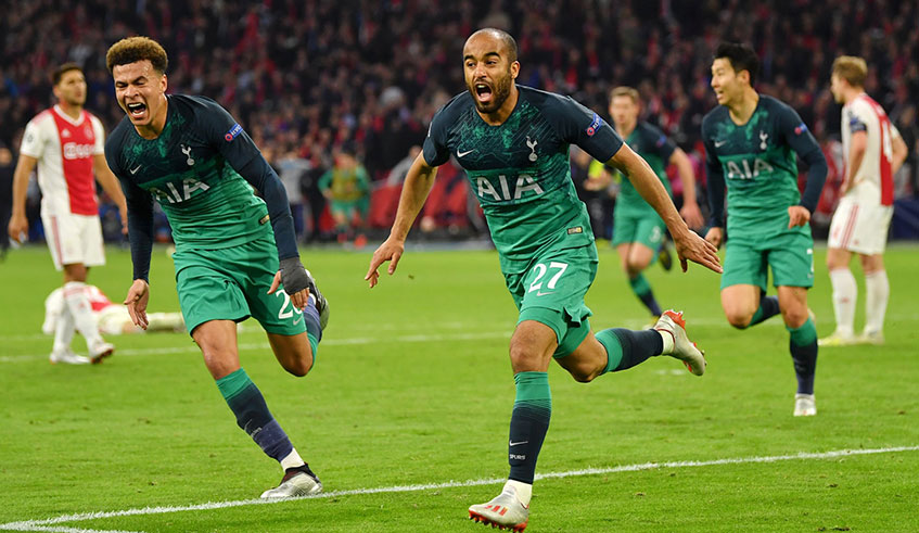 Lucas Moura (#27) celebrates with teammate Dele Alli (left) after scoring the decisive goal for Spurs