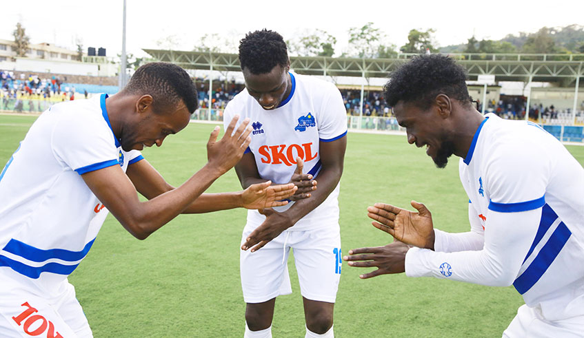 From L-R: Suleiman Mudeyi, Michael Sarpong and Hussein Habimana celebrate after Rayon Sports came from behind to beat Musanze 3-1 at Kigali Stadium on Friday. All photos by Sam Ngendahimana.