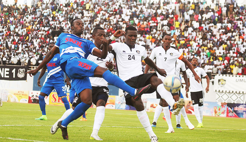 APR captain Jean Baptiste Mugiraneza (#7), seen here against Rayon Sports last month, has not completely ruled out the possibility of winning the league title. Sam Ngendahimana.