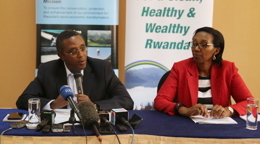 Minister for Environment, Dr Vincent Biruta addresses journalists during a media briefing as Coletha Ruhamya, the Director General of Rwanda Environment Management Authority looks on on Wednesday. / Craish Bahizi