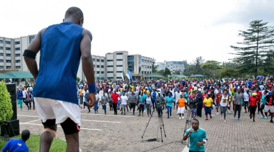 Kigali City residents engage in physical activity in the parking lot of Rwanda Revenue Authority in Kimihurura during a Car-Free Day exercise. Kigali was yesterday named as the first city in the world to win the Wellbeing City Award, in the category Public Health, bestowed by a coalition of non-profit organisations led by Canada-based NewCities. / File