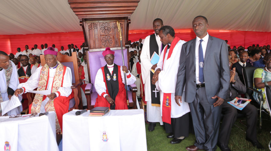 ishop Manasseh Gahima (with the crosier, centre), after his enthronement as the new Gahini Anglican Diocese prelate by Archbishop Laurent Mbanda (left) on Sunday. Gahima replaces long-serving Bishop Alexis Bilindabagabo, who had led the diocese since its creation in 1997. / Jean de Dieu Nsabimana