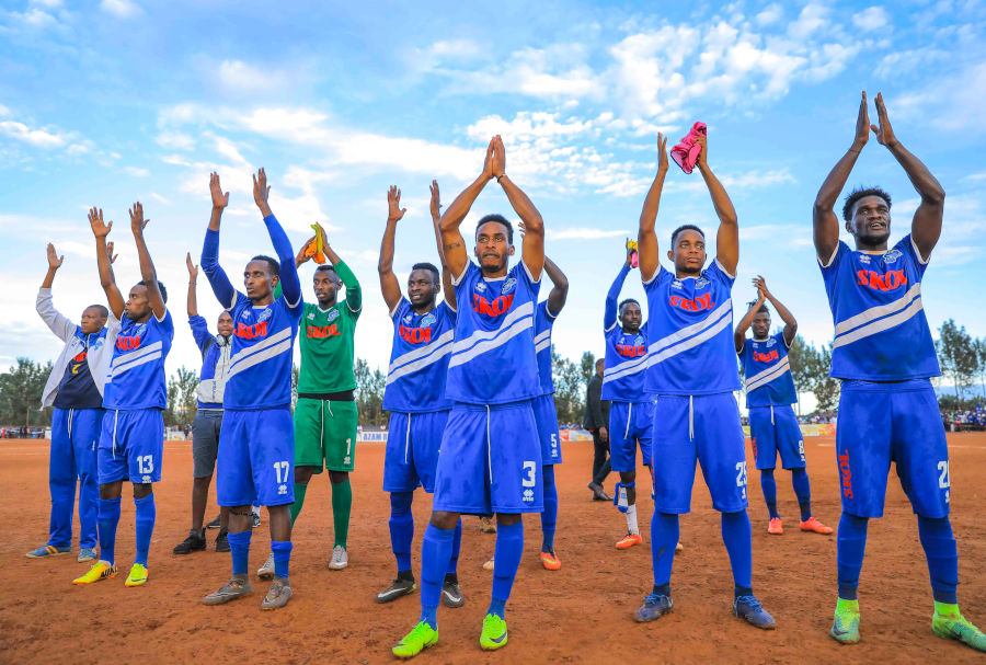 Rayon Sports players applaud their fans after clinching the Rwanda Premier League title with a 4-0 mauling of hosts Kirehe yesterday. / Courtesy