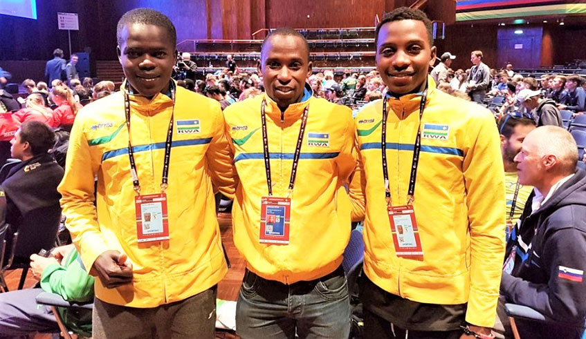 Former Olympian Nathan Byukusenge (C) is junior Team Rwandau2019s head coach since 2017. All eyes will be on Jean Eric Habimana (L) with Renus Byiza Uhiriwe (R) not included in the roster. Courtesy.